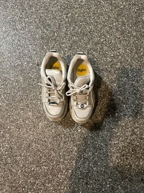 Buffalo women ivory/vintage sneakers. Sneakers is a hire with a hint of gray